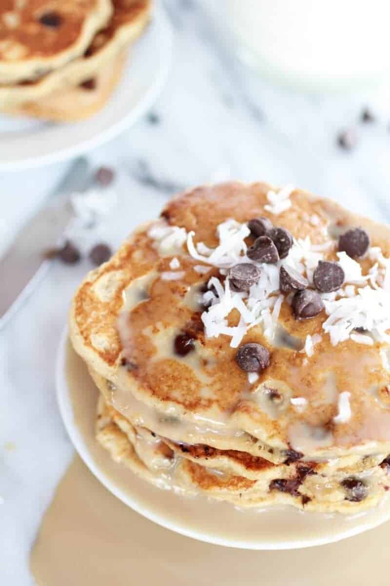 Whole Wheat Chocolate Chip Banana Bread Pancakes with a Vanilla Coconut Glaze