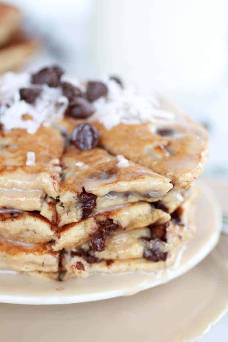 Whole Wheat Chocolate Chip Banana Bread Pancakes with a Vanilla Coconut Glaze