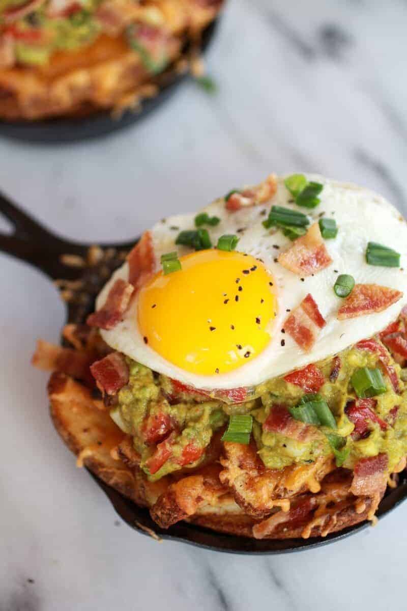 Cheesy Cajun Fries with Grilled Corn Guacamole, Bacon and Fried Eggs | halfbakedharvest.com/
