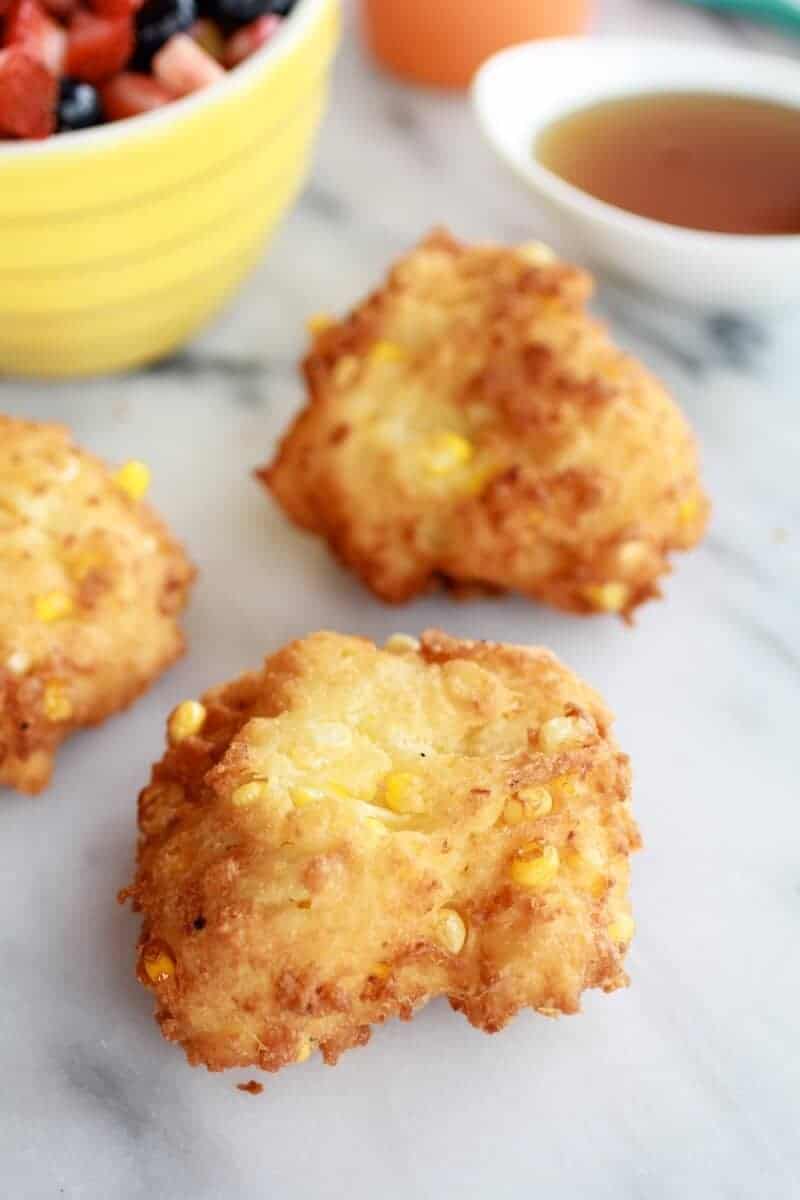 Corn Fritters with Coconut Whipped Cream and Sweet Honey Bourbon Syrup | https://fatburn.fit/