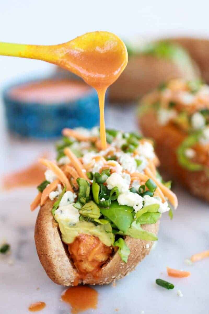 Healthy Loaded Cheddar + Blue Cheese Buffalo Chicken Dogs | halfbakedharvest.com/