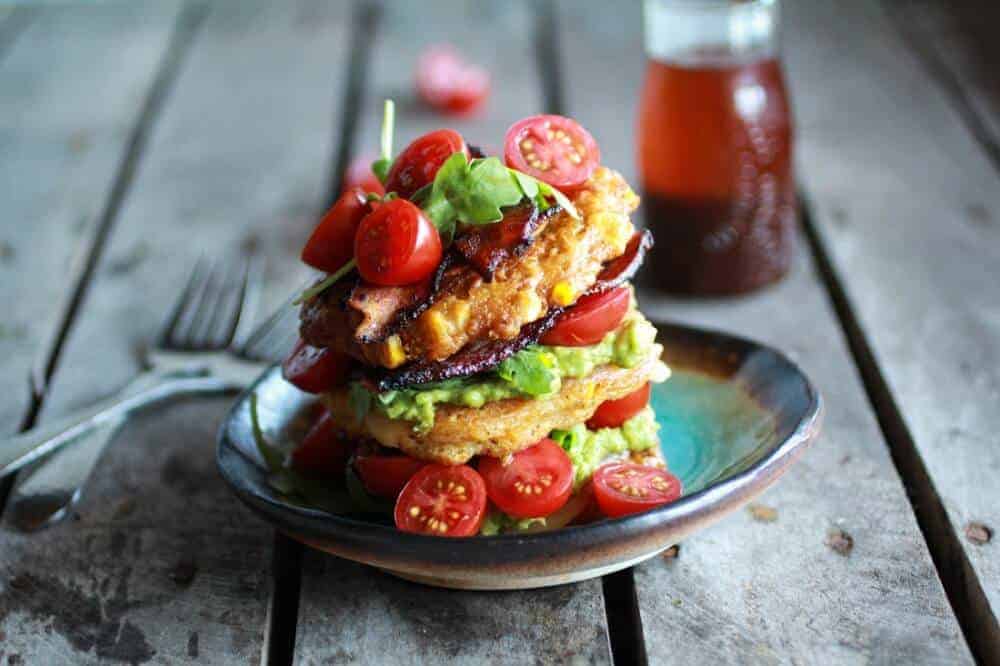 Avocado and Gouda BLT Corn Fritter Stacks with Chipotle Bourbon Dressing | halfbakedharvest.com