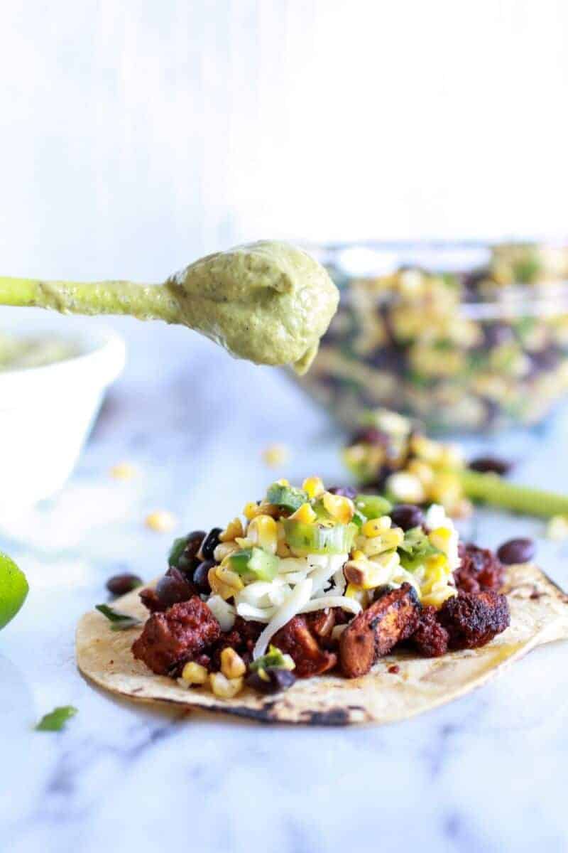 Sweet potato + Chorizo Tacos with Black Bean Salsa and Roasted Poblano Avocado Crema | halfbakedharvest.com