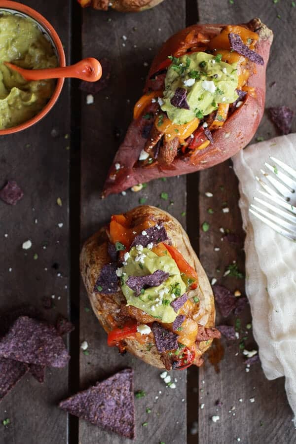 Steak Fajita Stuffed Baked Potatoes with Avocado Chipotle Crema | halfbakedharvest.com