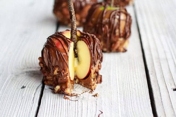Sweet and Salty Bourbon Cinnamon Pecan Caramel Apples + Chocolate Drizzle | halfbakedharvest.com