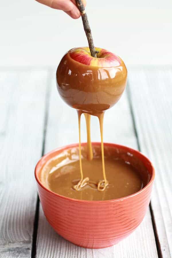 Sweet and Salty Bourbon Cinnamon Pecan Caramel Apples + Chocolate Drizzle | halfbakedharvest.com