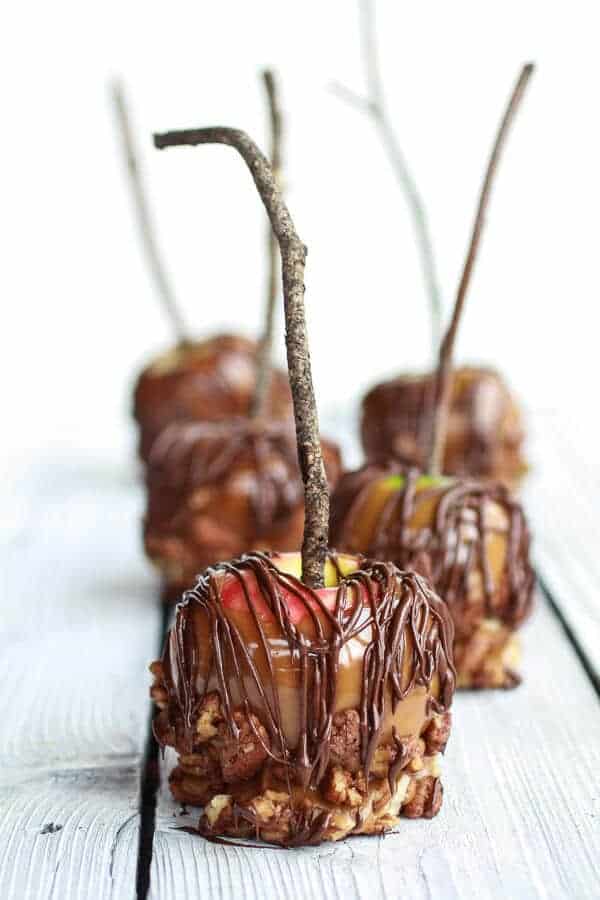 Sweet and Salty Bourbon Cinnamon Pecan Caramel Apples + Chocolate Drizzle | halfbakedharvest.com