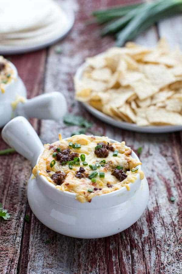 Cheesy Fontina Chorizo + Caramelized Onion and Artichoke Dip | halfbakedharvest.com