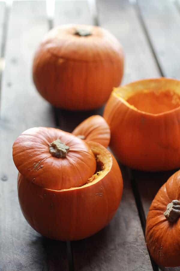 Roasted Garlic Sage Pesto Pumpkin Soup with Spicy Fried Pumpkin Seeds | halfbakedharvest.com