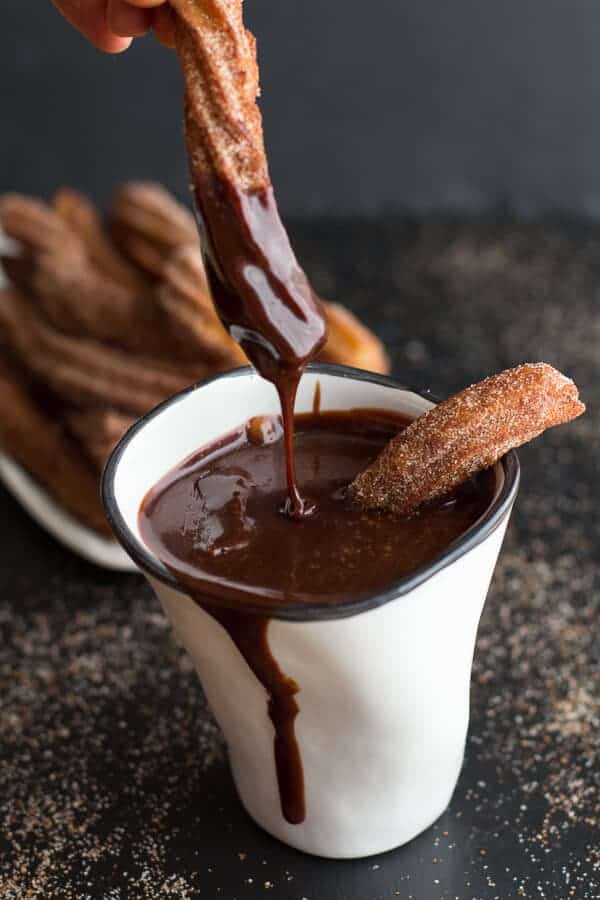 Mexican Beer Spiked Churros with Chocolate Dulce De Leche | halfbakedharvest.com