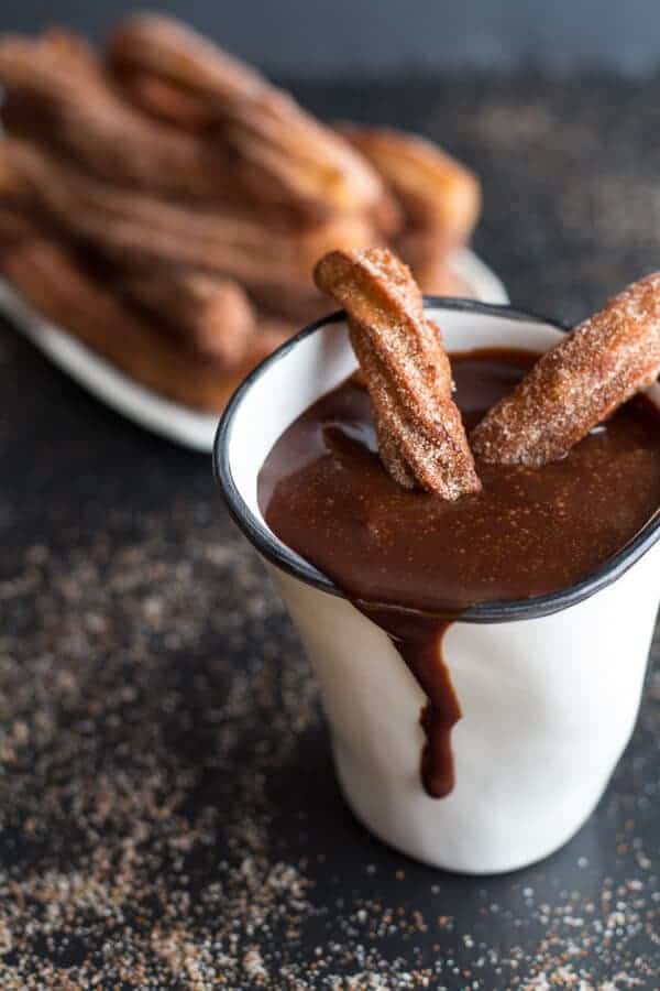 Mexican Beer Spiked Churros with Chocolate Dulce De Leche | halfbakedharvest.com