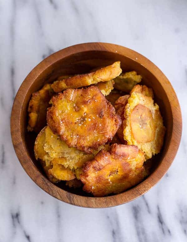 Cuban Black Bean and Rice Mojo Burgers with Slaw + Garlic Tostones | halfbakedharvest.com