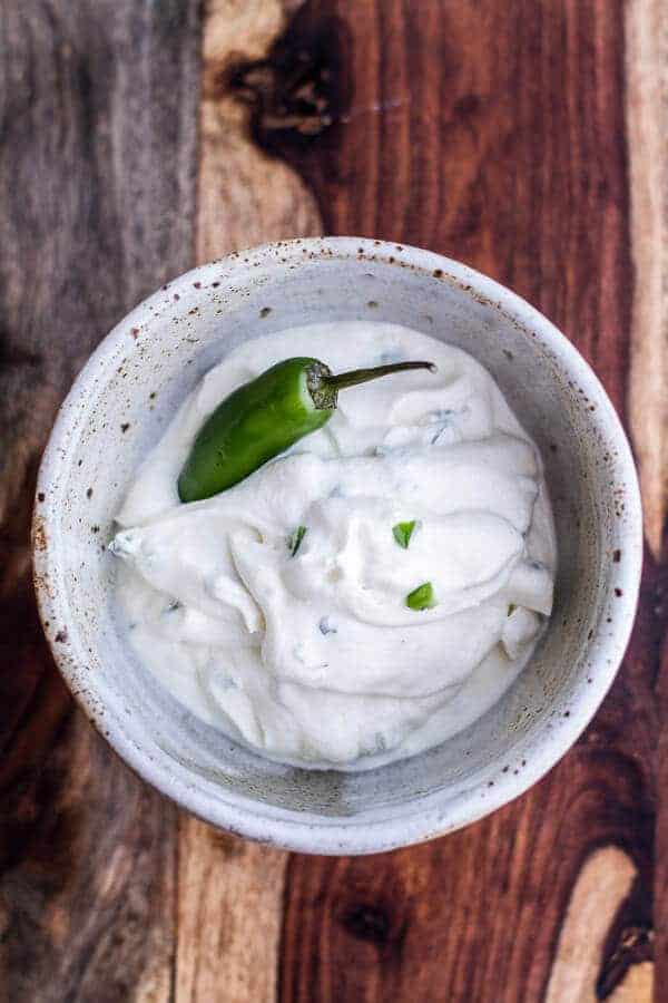 Spinach and Artichoke Corn Fritters with Brie and Sweet Honey Jalapeño Cream | halfbakedharvest.com