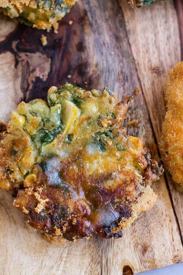 Spinach and Artichoke Corn Fritters with Brie and Sweet Honey Jalapeño Cream | halfbakedharvest.com
