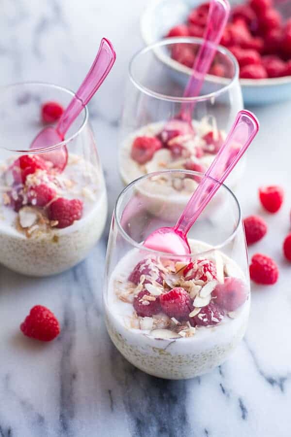 Vanilla Bean Coconut Quinoa Pudding with Honey Drizzled Raspberries | halfbakedharvest.com