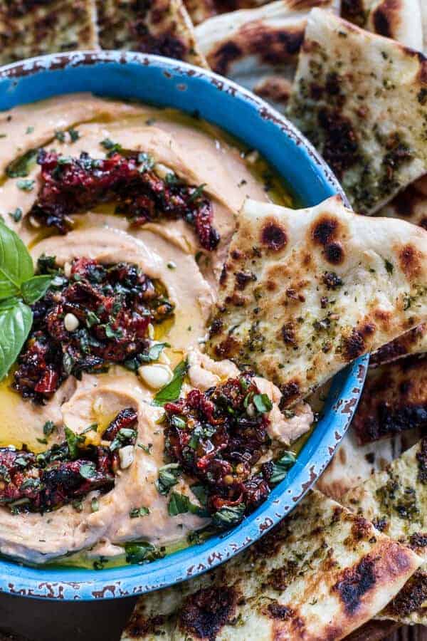 Cheesy Margarita Pizza Hummus with Grilled Pesto Pizza Bread | halfbakedharvest.com