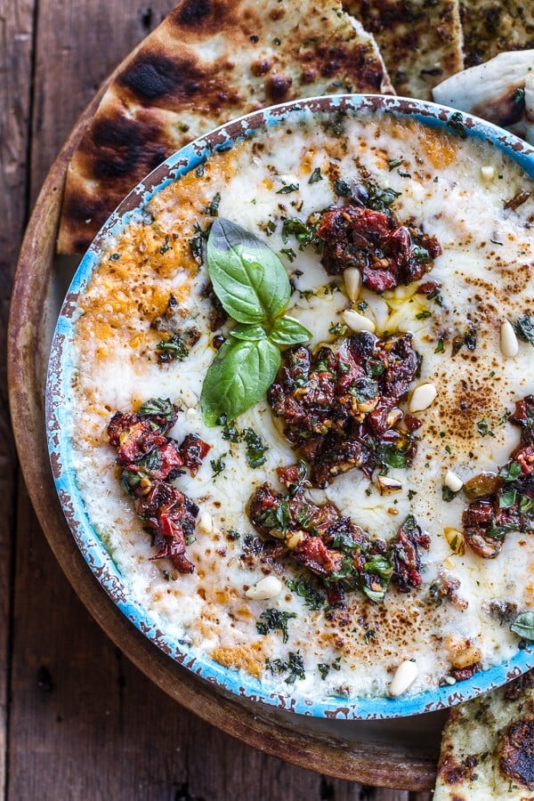 Cheesy Margarita Pizza Hummus with Grilled Pesto Pizza Bread | halfbakedharvest.com