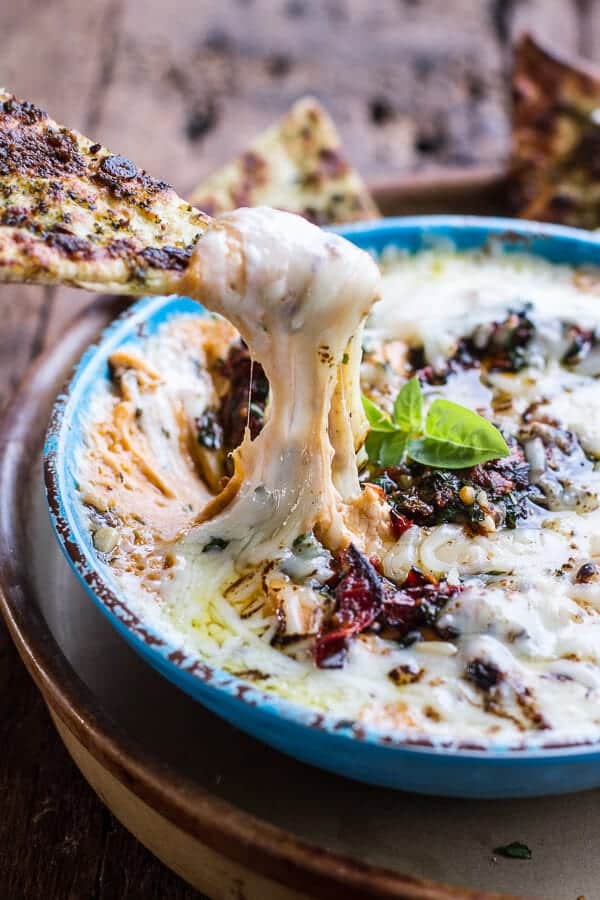 Cheesy Margarita Pizza Hummus with Grilled Pesto Pizza Bread | halfbakedharvest.com