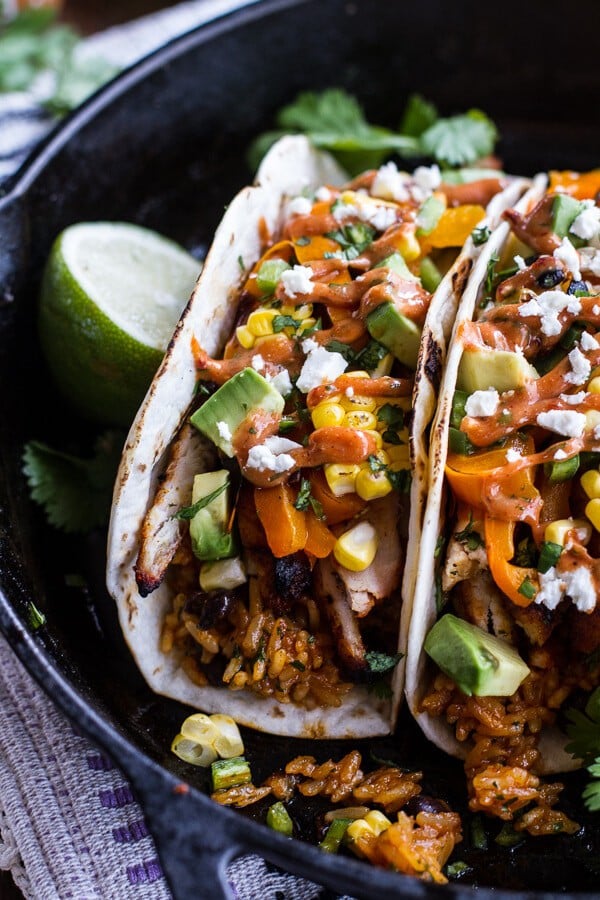Easy Chicken Fajitas with Cheesy Enchilada Rice + Spicy Tex-Mex Special Sauce | halfbakedharvest.com