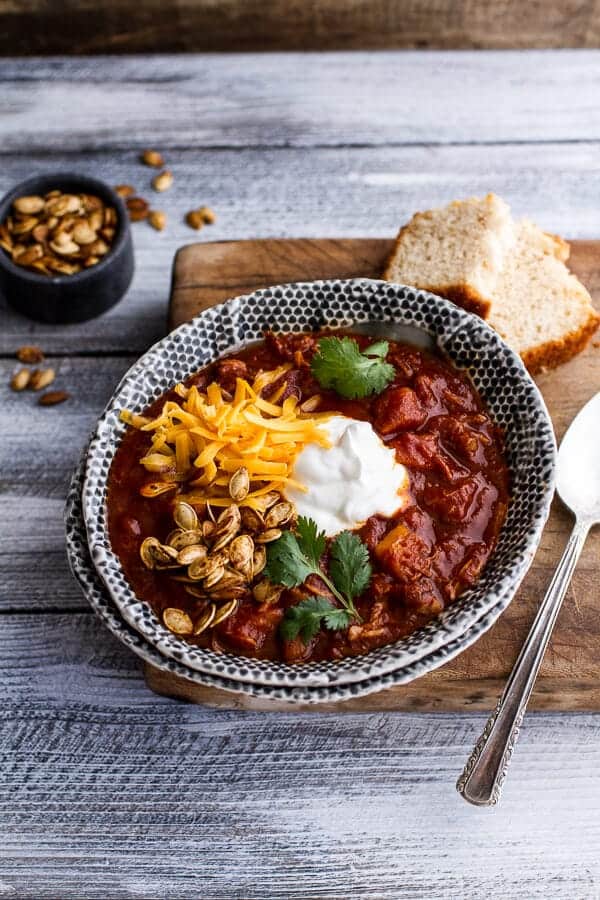 Crockpot Chipotle Pulled Pork Pumpkin Chili w/Cinnamon Roasted Pumpkin Seeds | halfbakedharvest.com @hbharvest