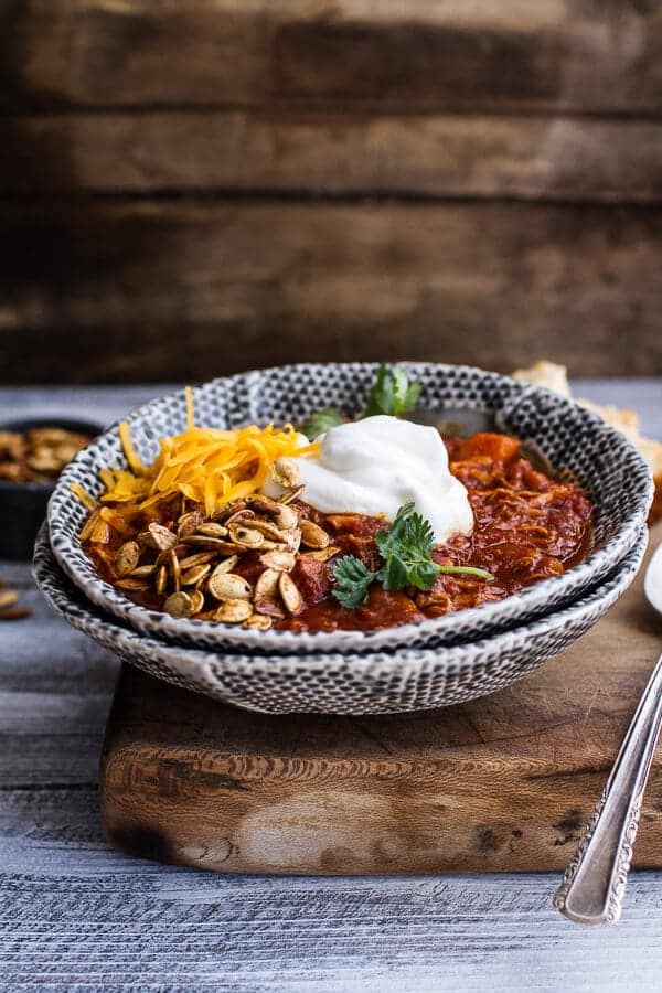 Crockpot Chipotle Pulled Pork Pumpkin Chili w/Cinnamon Roasted Pumpkin Seeds | halfbakedharvest.com @hbharvest