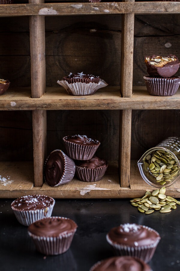 Mini Chocolate Pumpkin Seed Candy Peanut Butter Cups | halfbakedharvest.com @hbharvest