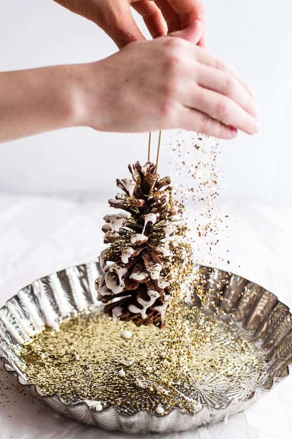 Homemade Holidays: Snowy, Sparkly Pine Cone Ornaments | halfbakedharvest.com @hbharvest