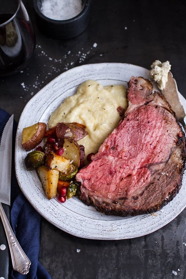 Coffee Rubbed Prime Rib Roast with Roasted Garlic Gorgonzola Butter | halfbakedharvest.com @hbharvest