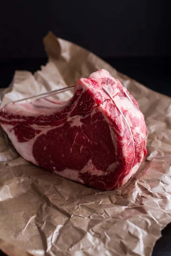 Coffee Rubbed Prime Rib Roast with Roasted Garlic Gorgonzola Butter | halfbakedharvest.com @hbharvest