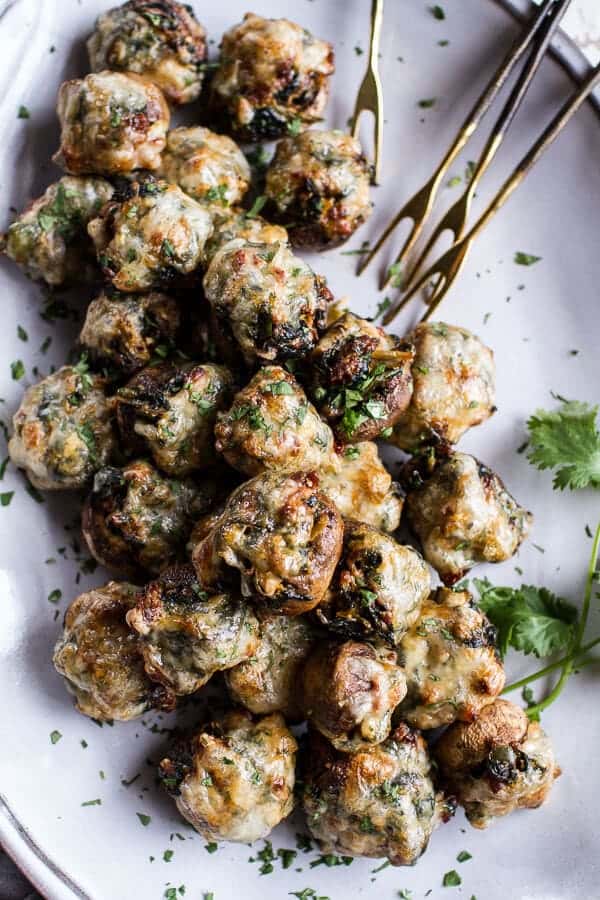Spicy Fontina Spinach, Artichoke and Chorizo Stuffed Mushrooms | halfbakedharvest.com @hbharvest
