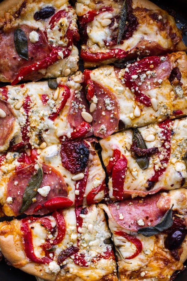 Sun-Dried Tomato and Olive Pesto Pizza with Salami + Roasted Red Peppers | halfbakedharvest.com @hbharvest