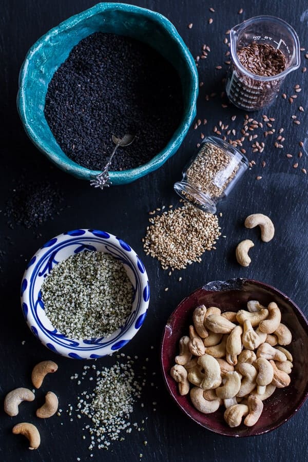 Dark Chocolate Dipped Crunchy Coconut Cashew Sesame Bars | halfbakedharvest.com @hbharvest
