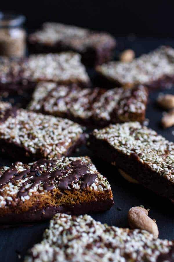 Dark Chocolate Dipped Crunchy Coconut Cashew Sesame Bars | halfbakedharvest.com @hbharvest