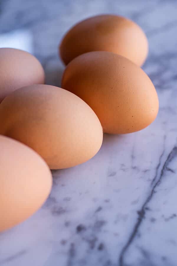 Northern Indian Style Baked Eggs with Green Harissa + Naan | halfbakedharvest.com @hbharvest