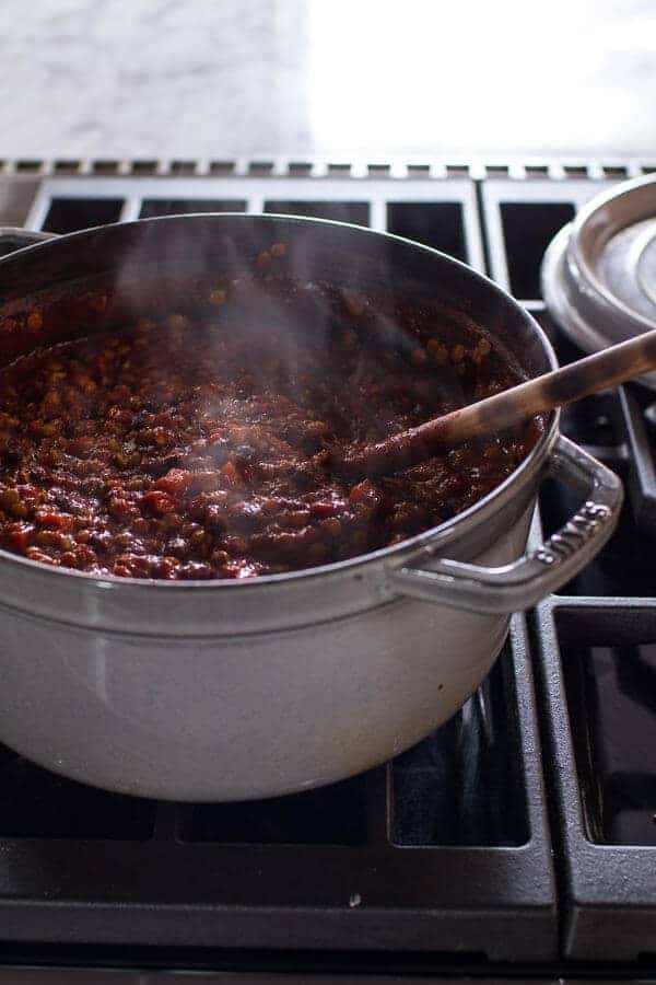 Spicy Black Bean and Lentil Chili with Cotija Guacamole + Chipotle Sweet Potato Fries | halfbakedharvest.com @hbharvest