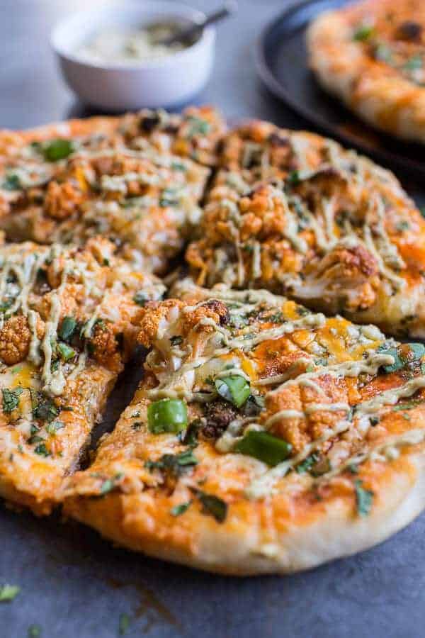 Buffalo Roasted Cauliflower Pizza with Chipotle Blue Cheese Avocado Drizzle | halfbakedharvest.com @hbharvest