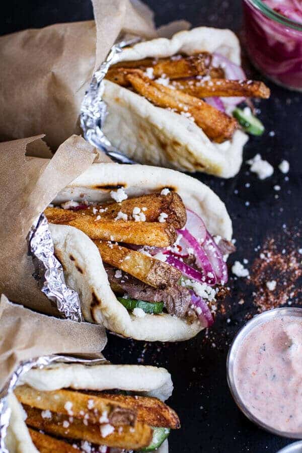 Greek Style Roasted Lamb Gyros with Harissa Spiced Tzatziki | halfbakedharvest.com @hbharvest