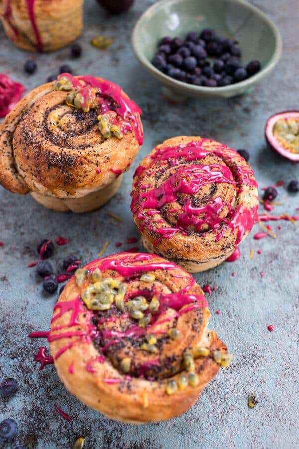 Meyer Lemon Poppy Seed Morning Buns with Blueberry Passionfruit Glaze | halfbakedharvest.com @hbharvest