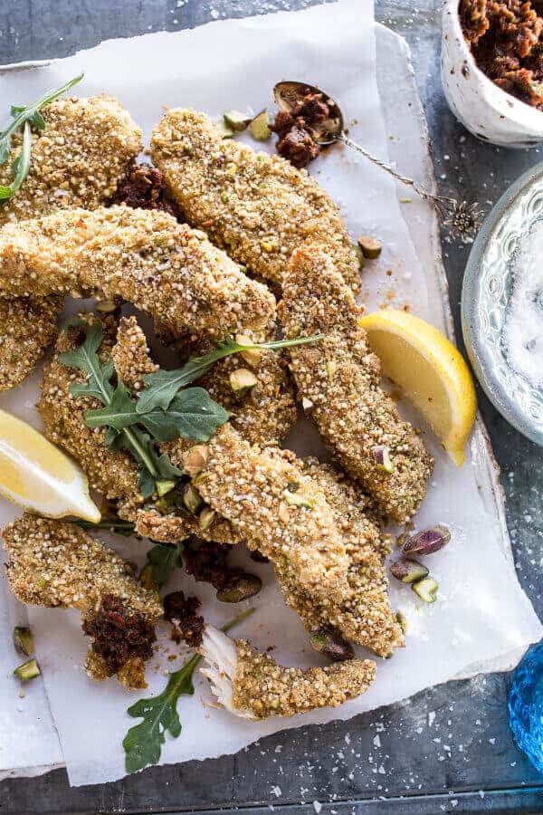 Pistachio Quinoa Dukkah Crusted Chicken Fingers with Sun-dried Tomato Pesto | halfbakedharvest.com @hbharvest