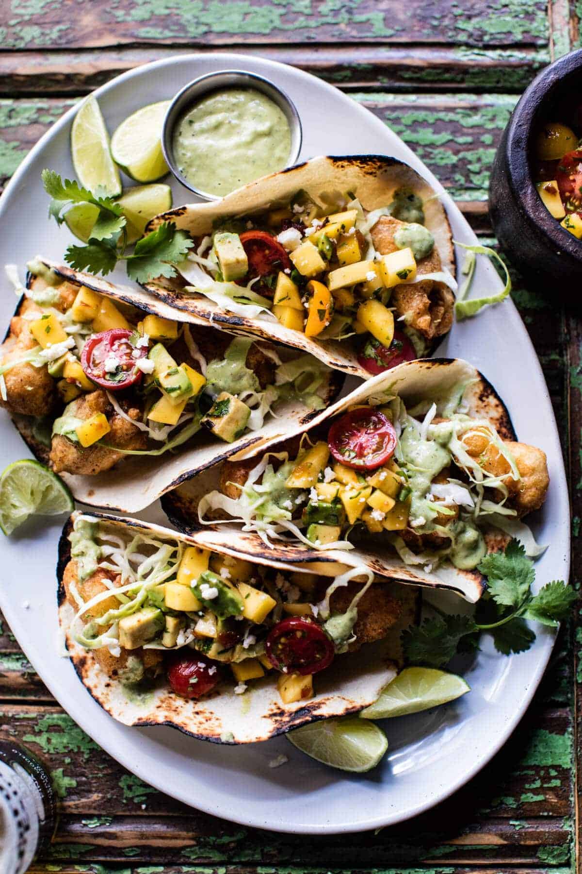 Baja Fish Tacos with Chipotle Mango Salsa | halfbakedharvest.com @hbharvest