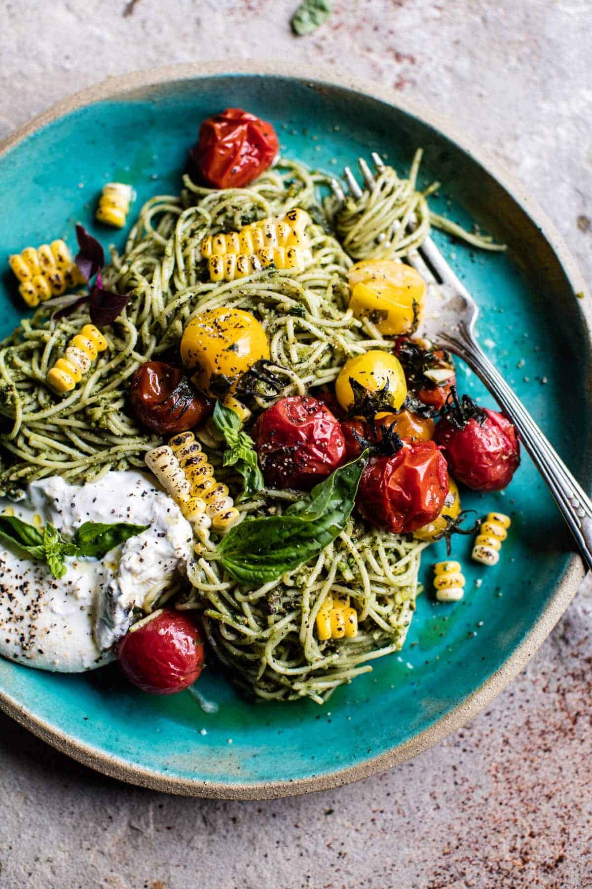 Charred Tomato and Corn Pesto Pasta | halfbakedharvest.com @hbharvest