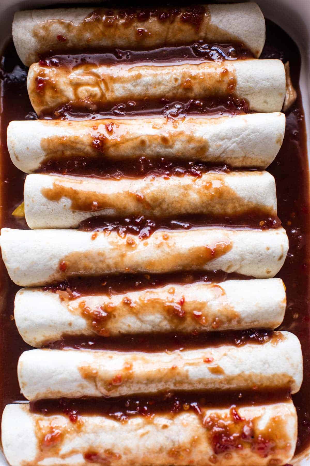 Cheesy Sweet and Sour Pomegranate Thai Chicken Enchiladas | halfbakedharvest.com @hbharvest