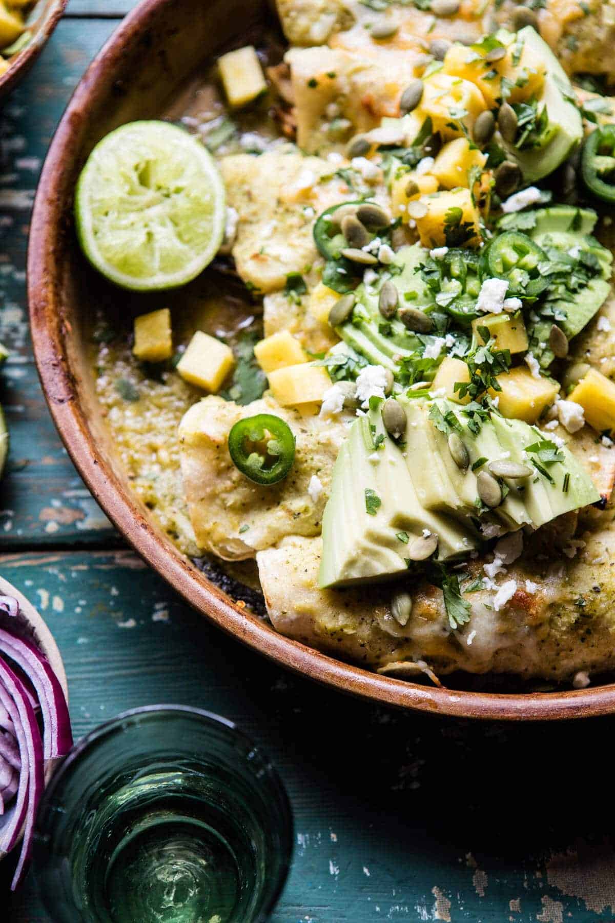 Lightened Up Salsa Verde Chicken Enchiladas with Pineapple Avocado Salsa | halfbakedharvest.com @hbharvest