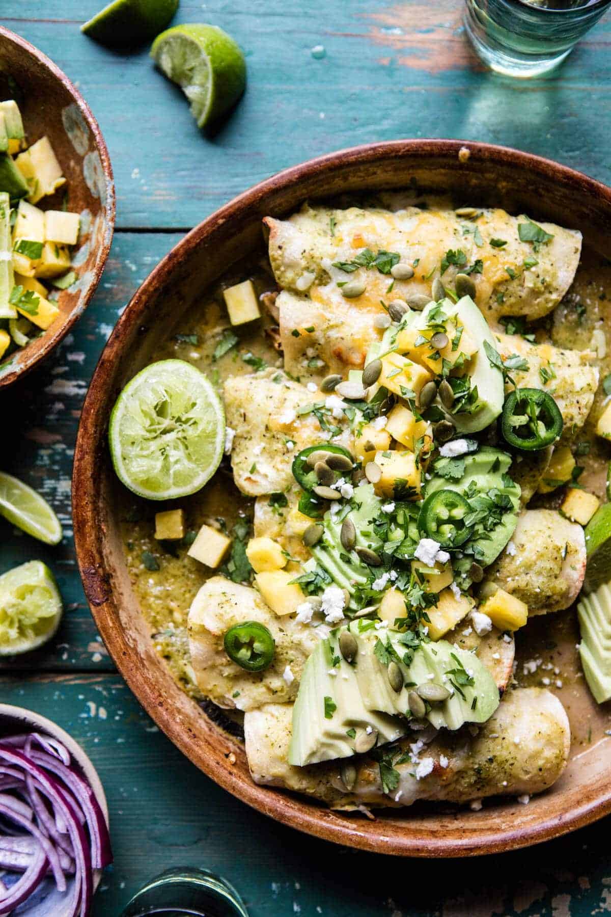 Lightened Up Salsa Verde Chicken Enchiladas with Pineapple Avocado Salsa | halfbakedharvest.com @hbharvest