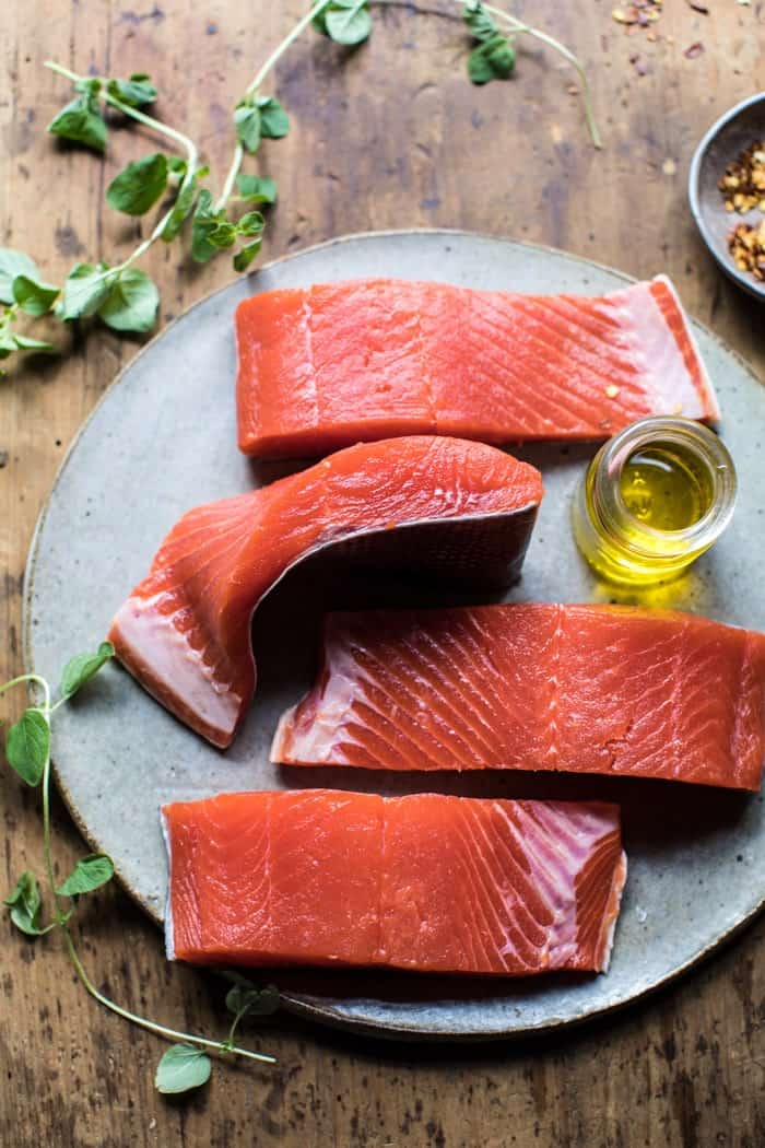 Sicilian Style Salmon with Garlic Broccoli and Tomatoes | halfbakedharvest.com @hbharvest