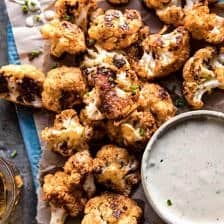 Spicy Cauliflower Cheese Bites with Tahini Ranch | halfbakedharvest.com #cauliflower #healthy #recipe