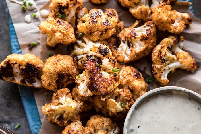 Spicy Cauliflower Cheese Bites with Tahini Ranch | halfbakedharvest.com #cauliflower #healthy #recipe