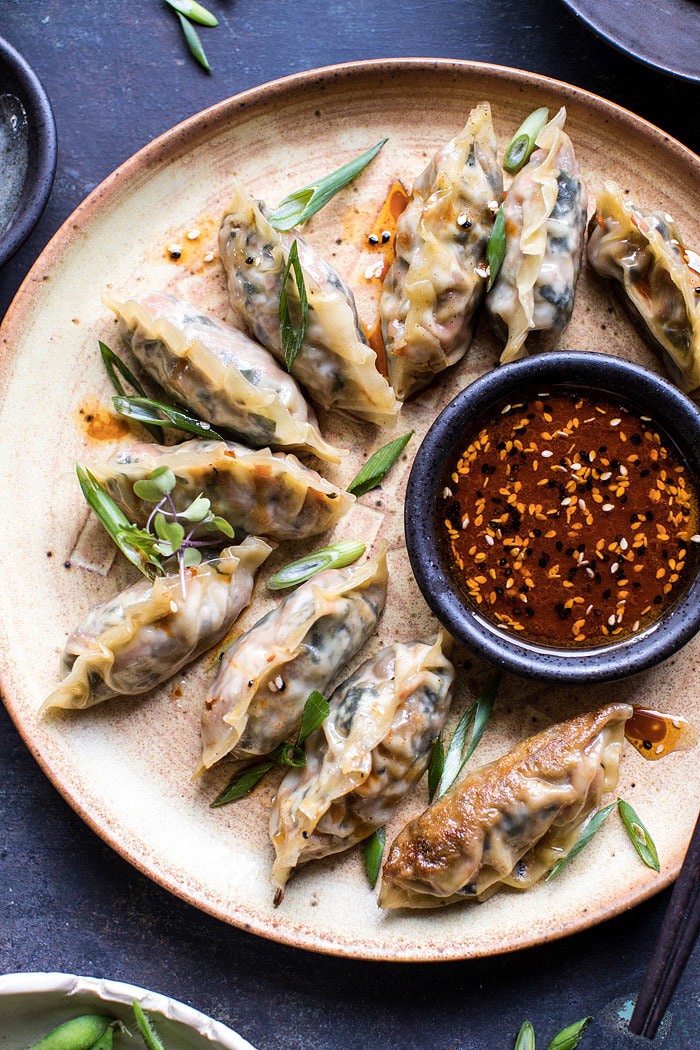 Homemade Vegetable Potstickers with Toasted Sesame Honey Soy Sauce | halfbakedharvest.com #vegan #recipes #healthy #homemade