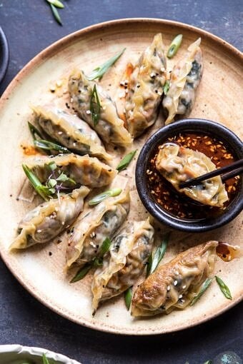 Homemade Vegetable Potstickers with Toasted Sesame Honey Soy Sauce | halfbakedharvest.com #vegan #recipes #healthy #homemade