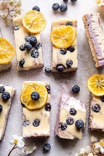Blueberry Lemon Cheesecake Bars with Candied Lemon | halfbakedharvest.com #spring #easter #cheesecake #dessert